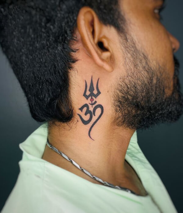 Om tattoo on neck