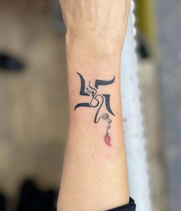 Swastik and Om Symbol Tattoo on Wrist