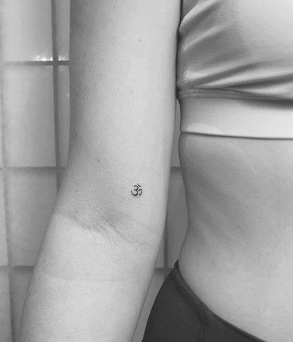 Tiny Om Symbol Tattoo