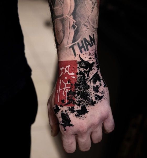 Trash Polka Hand Tattoo