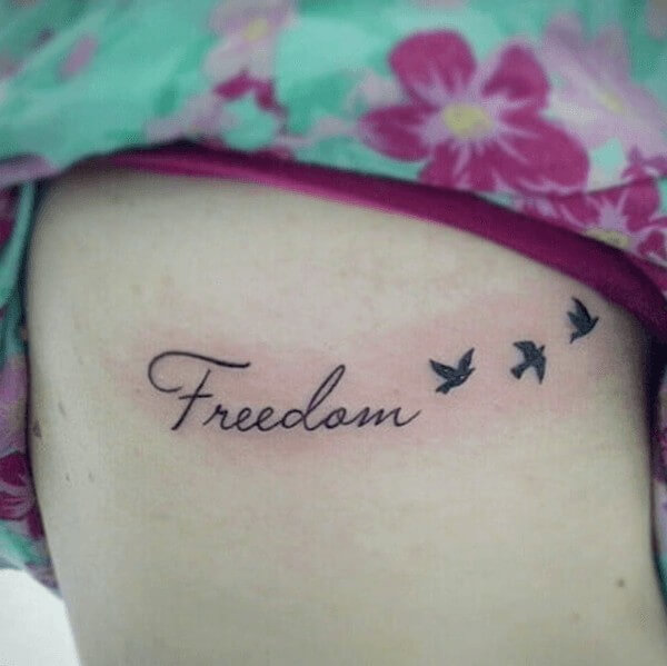 Freedom Tattoo on Rib