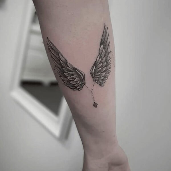 Freedom Wing Tattoo on Inner Arm