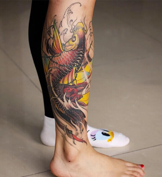 Koi Fish Tattoo on girl's leg