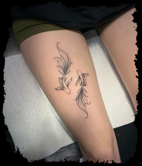 Koi Fish Tattoo on girl's leg