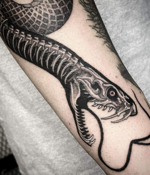 Black Skeleton Snake Tattoo