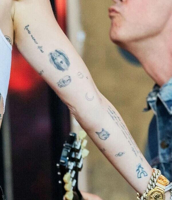 Miley Cyrus tattoos on arms