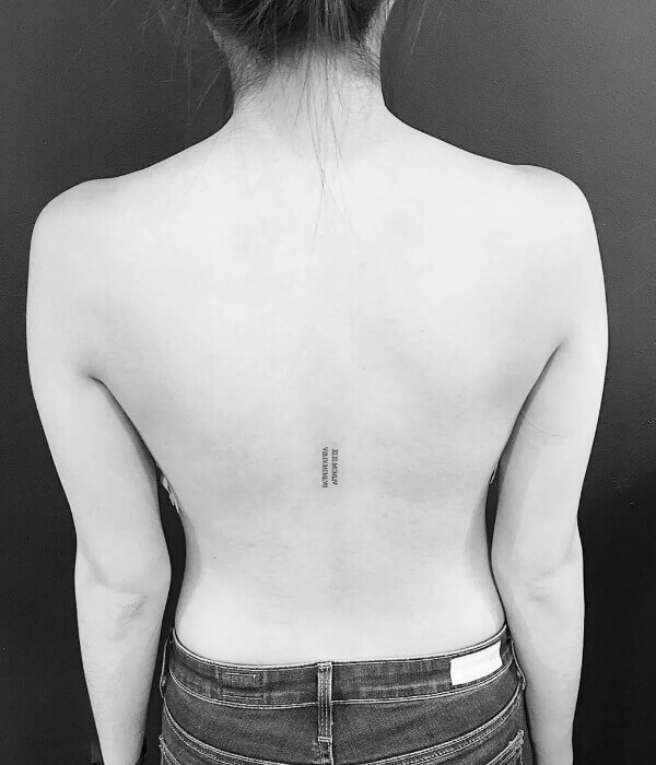 Tiny Back Tattoo