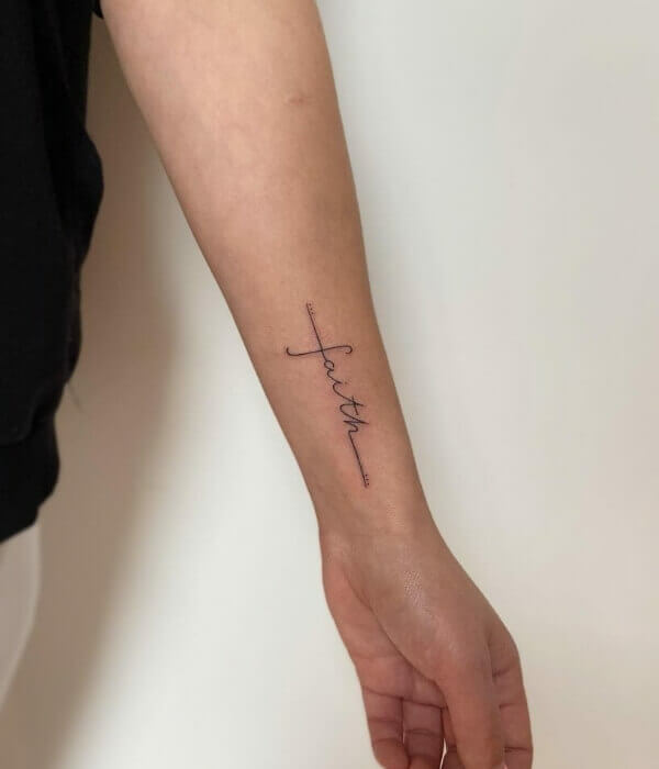 Fine line tattoo with Cross 