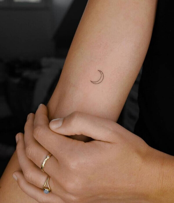 Fine line tattoo with a Moon