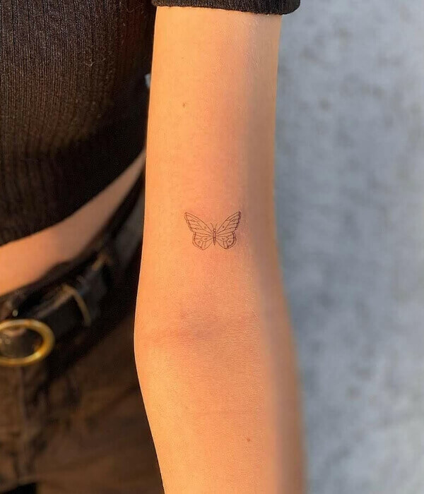 Fine line tattoo with butterfly on Hand