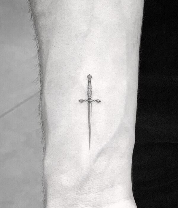 Fine line tattoo with sword on Hand