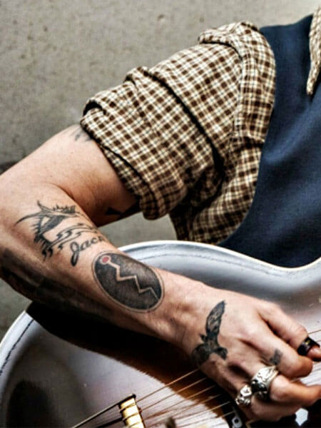 Johnny Depp Snake Tattoo