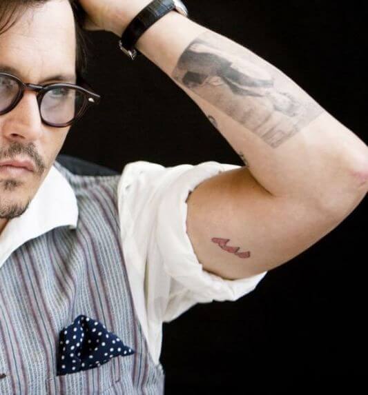 Johnny Depp Three Hearts Tattoo