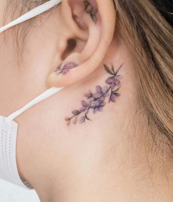 Larkspur Flower Behind The Ear Tattoo