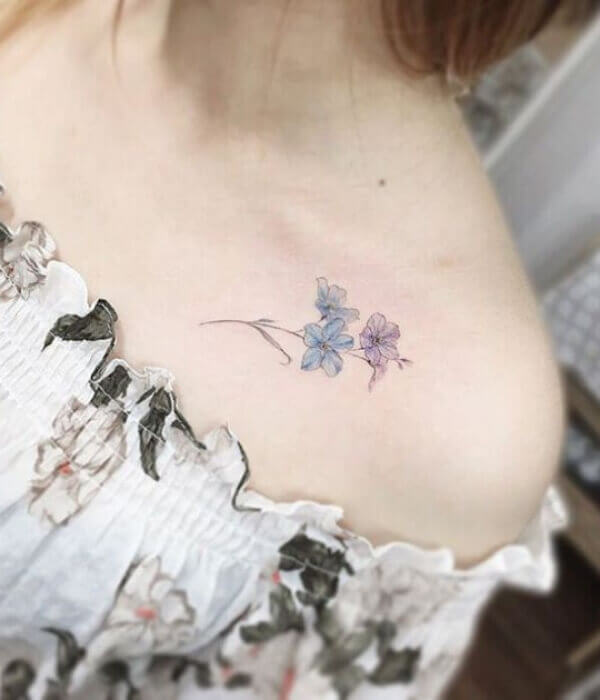 Larkspur Flower Tattoo On Collarbone