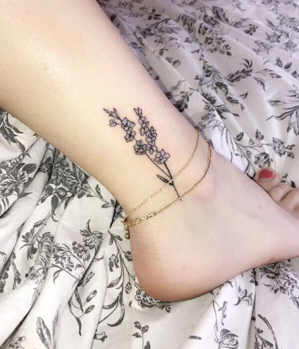 Ideas to be unique by getting lovely watercolor larkspur tattoo