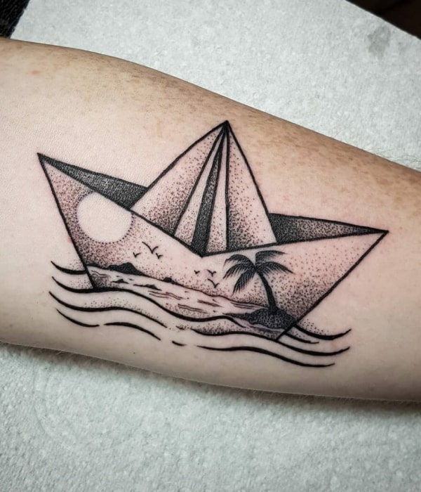 Small boat tattoo on the bicep  Tattoogridnet