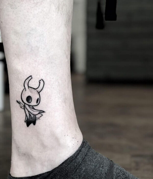 Small Black Ink Ghost Tattoo on Ankle