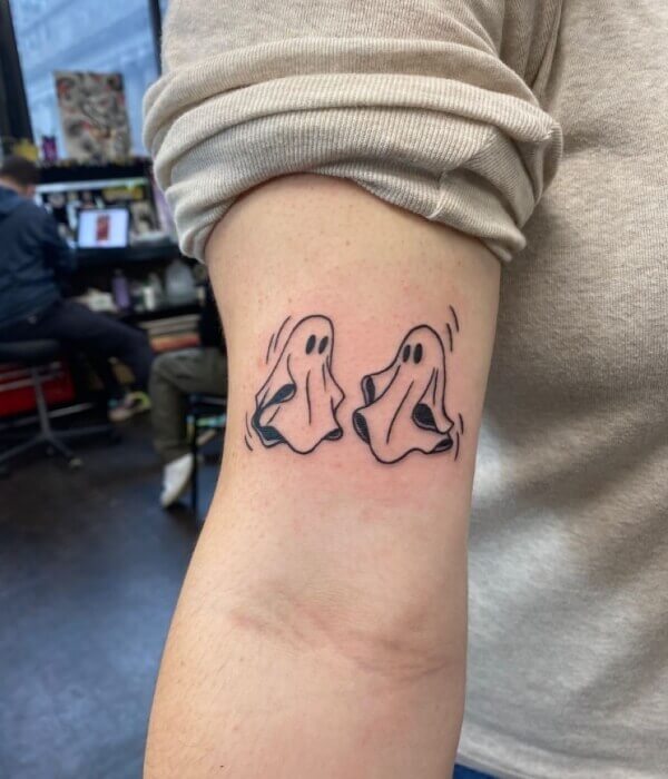 Ghost tattoo on the ankle