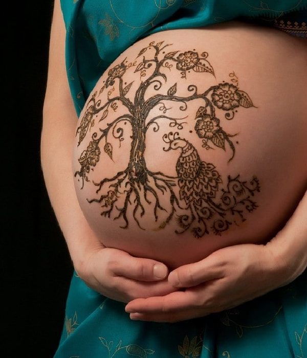 Pregnancy and stomach tattoo