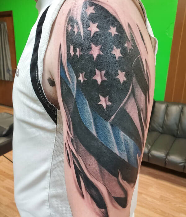 Police-inspired American flag tattoo