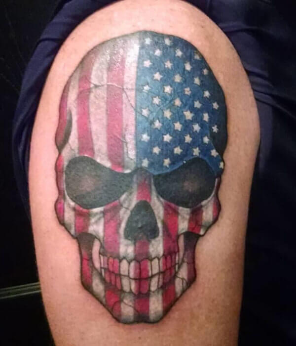 Grey Ink Skull With American Flag Tattoo