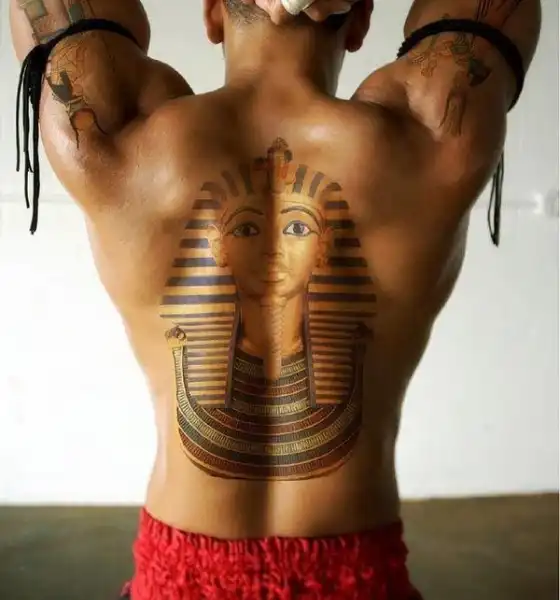 Spine Tattoo with Egyptian Drawing