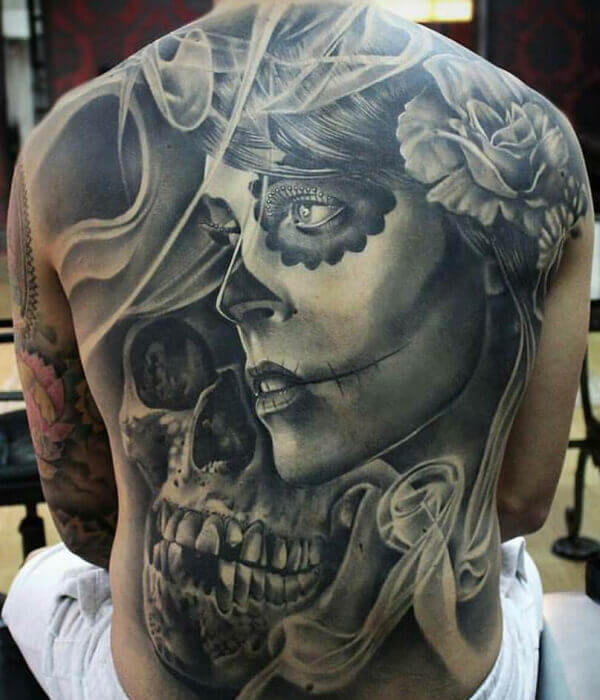 Spine skull tattoo