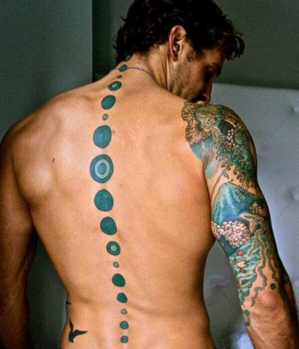 Spine tattoo on the entire spine