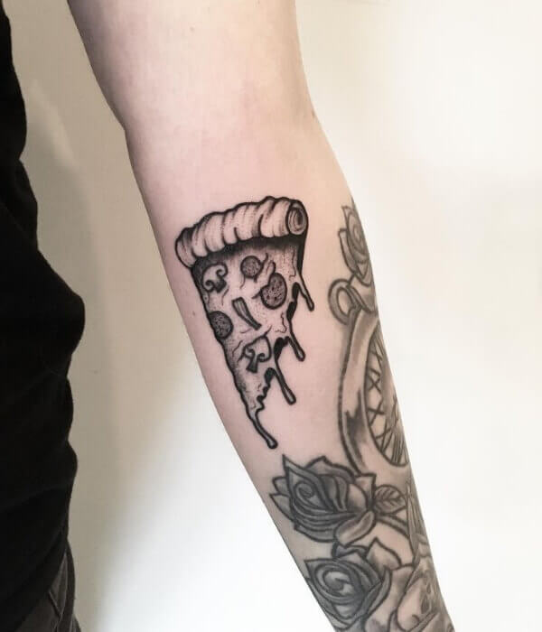 Trendy Pizza tattoo on the forearm