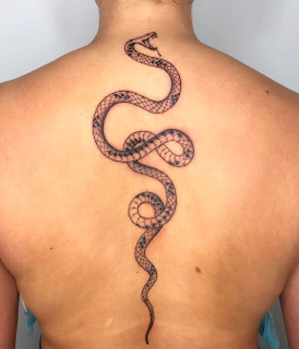 snake spine tattoo men