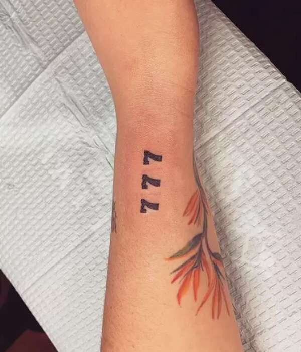777 Good Luck Tattoo on Hand