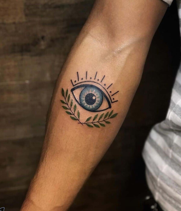 Evil Eye Good Luck Tattoo on hand 