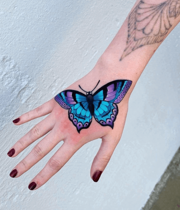 A string of blue butterfly tattoos