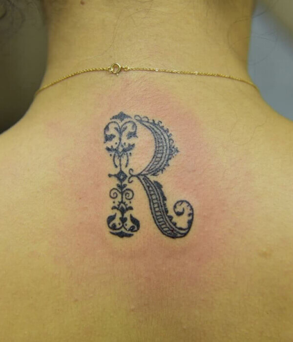 Adorable Letter R Tattoo Design On Neck