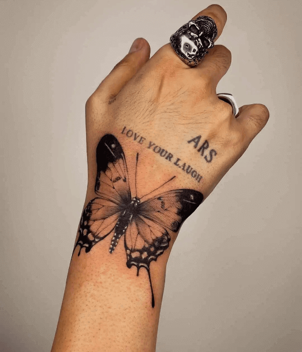 Big beautiful blackwork butterfly hand tattoo