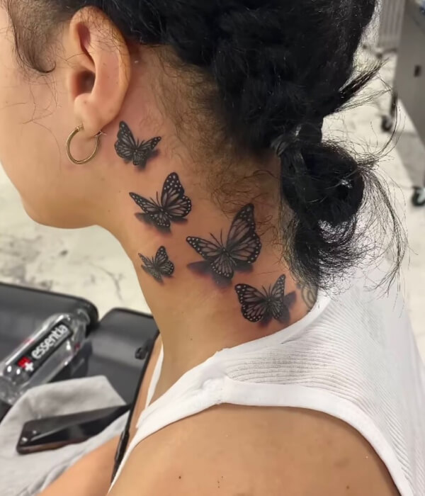 Butterfly neck tattoo