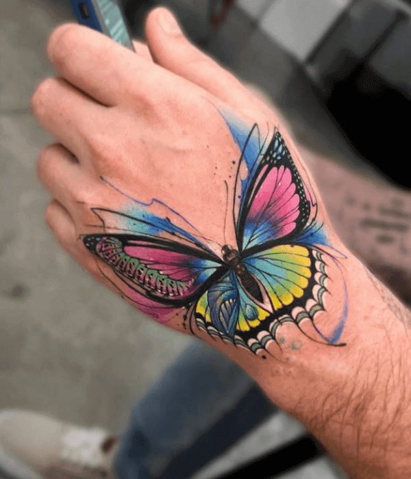 Colorful butterfly hand tattoo