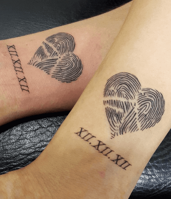 Couple fingerprint tattoo