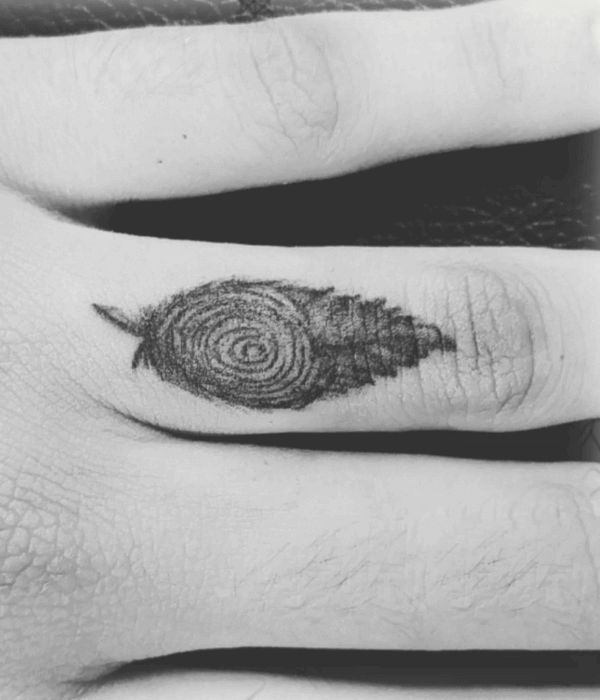 Feather fingerprint tattoo