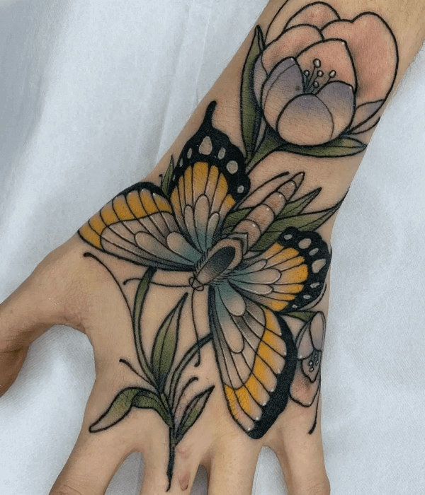 Fine line with watercolor butterfly hand tattoo