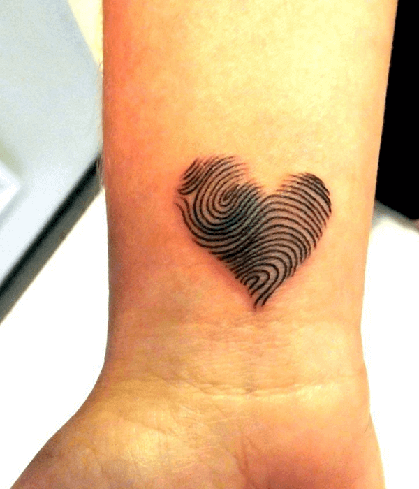 Fingerprint heart tattoo on the wrist