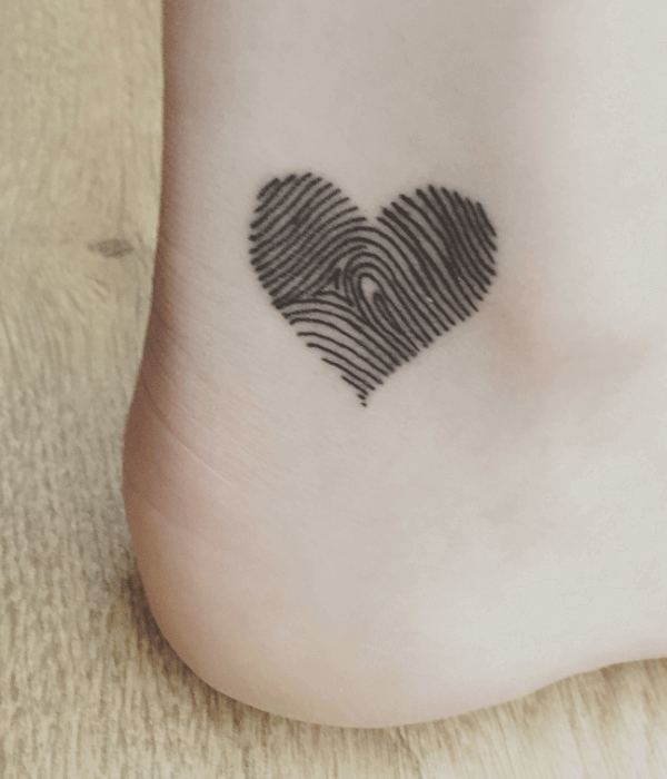 Fingerprint heart tattoo