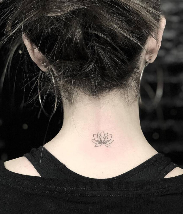 Lotus flower back of the neck tattoo