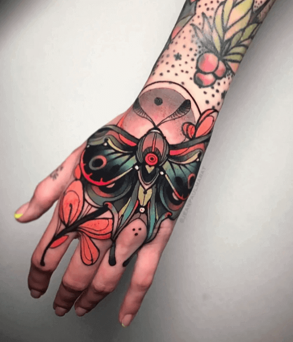 Neo traditional butterfly hand tattoo