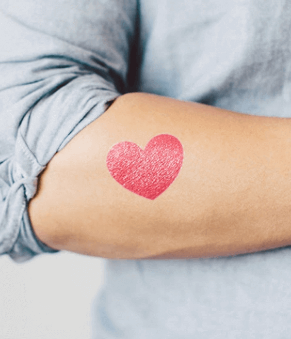 Red heart fingerprint tattoo