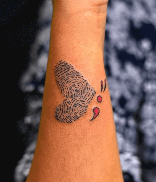 Semicolon fingerprint tattoo