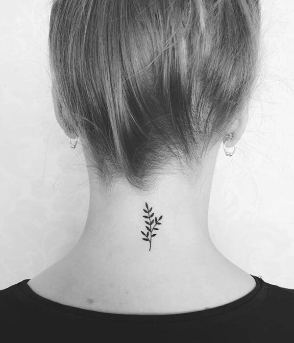 Simple small leaves back of the neck tattoo