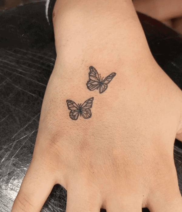 2 small Butterfly tattoo on hand for girl