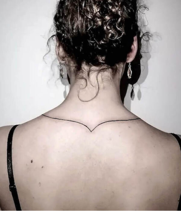 Thick line back of the neck tattoo